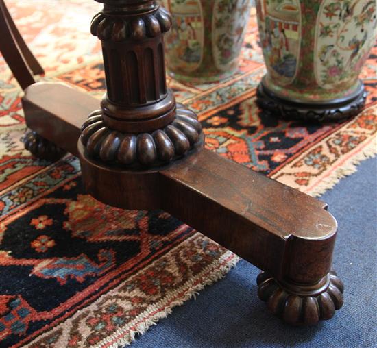 A Regency rosewood library table, W.4ft D.2ft 4in. H.2ft 5in.